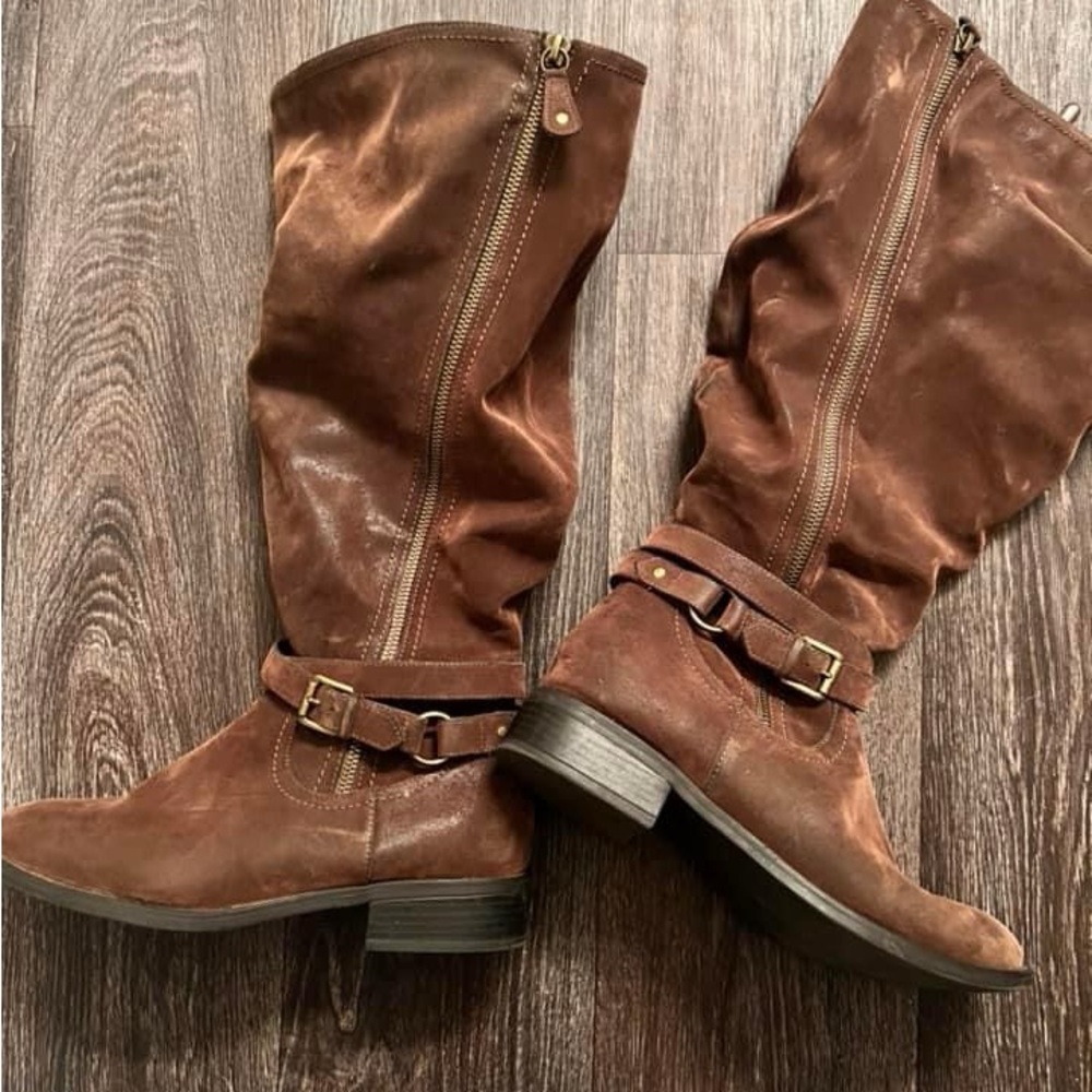 Torrid: size 9.5 wide width and wide calf. Worn once.